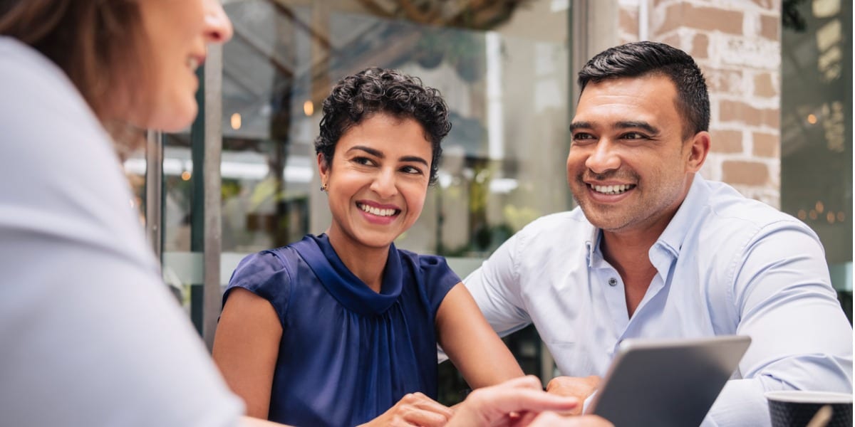 two people smiling